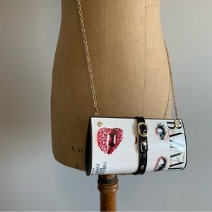 Katie Perry on the Cover of Bazaar Clutch/Purse